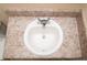 The white bathroom sink features a speckled countertop and chrome faucet at 142 Susie Creek Ln, Villa Rica, GA 30180
