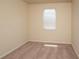 Bedroom featuring neutral walls, carpet flooring, and a window at 142 Susie Creek Ln, Villa Rica, GA 30180