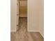 Bedroom closet featuring white door, carpet, and shelving at 142 Susie Creek Ln, Villa Rica, GA 30180