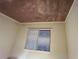 A sunlit bedroom featuring a window with blinds at 142 Susie Creek Ln, Villa Rica, GA 30180