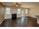 Living Room with hardwood floors, fireplace, and natural light at 142 Susie Creek Ln, Villa Rica, GA 30180