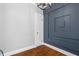 Well-lit room featuring hardwood floors and access to kitchen at 20 Collier Nw Rd # 11, Atlanta, GA 30309