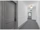 Clean, well-lit hallway with neutral colors and access to apartments at 20 Collier Nw Rd # 11, Atlanta, GA 30309