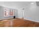 Bright living room featuring hardwood floors and ample natural light at 20 Collier Nw Rd # 11, Atlanta, GA 30309