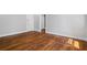Spacious room with hardwood floors, crisp white trim and freshly painted walls at 20 Collier Nw Rd # 11, Atlanta, GA 30309