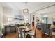 Dining room with hardwood floors, chandelier, and large buffet for elegant entertaining at 2095 Southers Cir, Suwanee, GA 30024