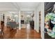Elegant entryway showcases hardwood floors and open access to the bright and inviting living spaces at 2095 Southers Cir, Suwanee, GA 30024