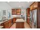 Kitchen with granite countertops, stainless steel appliances, and custom cabinetry at 2095 Southers Cir, Suwanee, GA 30024