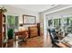 Lovely office space with built-in bookshelves, hardwood flooring, and multiple workstations at 2095 Southers Cir, Suwanee, GA 30024