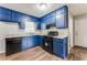 Updated kitchen featuring sleek countertops, modern appliances, and plenty of cabinet space at 5032 Central Church Rd, Douglasville, GA 30135