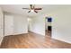 Open-concept living area with modern flooring and a view into the kitchen, providing a seamless flow at 5032 Central Church Rd, Douglasville, GA 30135