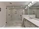 Bathroom featuring double vanity, marble counters, and glass shower at 1372 Doublegate Dr, Atlanta, GA 30319