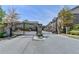 Gated community entrance featuring brick pillars and wrought iron gates for added security and privacy at 1372 Doublegate Dr, Atlanta, GA 30319