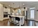 Stylish kitchen with a center island, stainless steel appliances, and modern white cabinetry at 1372 Doublegate Dr, Atlanta, GA 30319