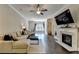 Elegant living room with hardwood floors, a fireplace, and open layout, ideal for entertaining at 1372 Doublegate Dr, Atlanta, GA 30319