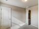 Cozy bedroom with neutral walls, carpet, and white doors at 2722 Sardis Chase Ct, Buford, GA 30519