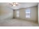 Spacious bedroom featuring large windows, carpet, and neutral paint at 2722 Sardis Chase Ct, Buford, GA 30519