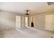 Spacious carpeted bedroom with multiple doorways and ample natural light at 2722 Sardis Chase Ct, Buford, GA 30519