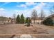 View of the community playground with a slide and climbing features on pea gravel at 2722 Sardis Chase Ct, Buford, GA 30519