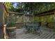 Cozy deck with dining set, perfect for enjoying meals and gatherings outdoors at 415 Westlake Nw Ct, Marietta, GA 30064