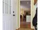 Entryway view showcasing hardwood floors leading to the kitchen and dining areas at 415 Westlake Nw Ct, Marietta, GA 30064
