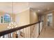 Hallway with chandelier and a large window at 415 Westlake Nw Ct, Marietta, GA 30064