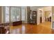 Cozy living room with a hardwood floor, a bay window, and a view into the dining room at 415 Westlake Nw Ct, Marietta, GA 30064