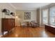 Bright living room featuring hardwood floors, neutral walls, and natural light from large windows at 415 Westlake Nw Ct, Marietta, GA 30064