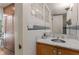 This bathroom includes a marble counter and glass block window at 1105 Crest Valley Dr, Sandy Springs, GA 30327