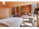Bedroom with fireplace and nature views at 1105 Crest Valley Dr, Sandy Springs, GA 30327