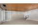 This bonus room includes built-in shelves, large cabinets, and a staircase at 1105 Crest Valley Dr, Sandy Springs, GA 30327