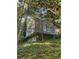 Exterior view of the house surrounded by greenery at 1105 Crest Valley Dr, Sandy Springs, GA 30327
