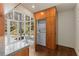 Laundry area with granite countertop and large window with a view of trees at 1105 Crest Valley Dr, Sandy Springs, GA 30327
