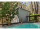 Back view of house with swimming pool at 1105 Crest Valley Dr, Sandy Springs, GA 30327