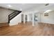 Finished basement with wood floors, stairs, and bathroom at 1650 Randee Nw St, Atlanta, GA 30318