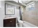 Basement bathroom features a tiled shower and vanity at 1650 Randee Nw St, Atlanta, GA 30318