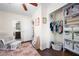 Bedroom room with wood floors, glider, and closet that is well-organized at 1650 Randee Nw St, Atlanta, GA 30318