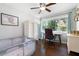 A bright room with hardwood floors and large windows offering natural light at 1650 Randee Nw St, Atlanta, GA 30318