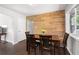 Cozy dining room showcasing a wood accent wall and natural light at 1650 Randee Nw St, Atlanta, GA 30318