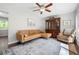 Inviting living room with stylish furnishings and a ceiling fan at 1650 Randee Nw St, Atlanta, GA 30318
