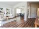 Bright living room featuring hardwood floors and built-in bookshelves at 175 Diamond Ridge Ave, Canton, GA 30114