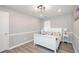 Cozy bedroom with calming gray walls, side tables, and ample closet space at 238 Knob Hill Dr, Locust Grove, GA 30248