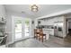 Bright eat-in kitchen featuring stainless appliances, an island, and easy access to the deck at 238 Knob Hill Dr, Locust Grove, GA 30248