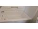 Clean white bathtub with shower fixtures and white surround at 2432 Pendergrass Ln, Ellenwood, GA 30294