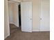 Bedroom with neutral walls and carpet at 2432 Pendergrass Ln, Ellenwood, GA 30294