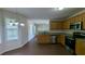 Well-equipped kitchen with granite countertops, stainless steel appliances, and ample cabinet space at 2432 Pendergrass Ln, Ellenwood, GA 30294