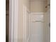 A white shower stall with built-in shelves at 2432 Pendergrass Ln, Ellenwood, GA 30294