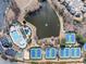 Community amenities include tennis courts, a pool, and a serene lake, creating a vibrant neighborhood at 4155 Winterberry Rd, Cumming, GA 30040