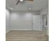 Inviting bedroom features neutral walls, light flooring, and a ceiling fan at 4155 Winterberry Rd, Cumming, GA 30040