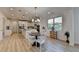 Open-concept kitchen and dining area filled with natural light, perfect for entertaining at 4155 Winterberry Rd, Cumming, GA 30040